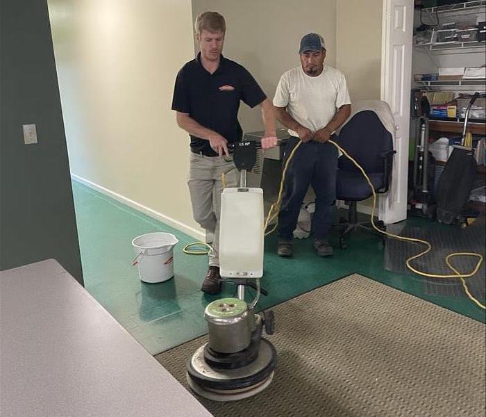 The post-construction cleanup process ends with this carpet cleaning.